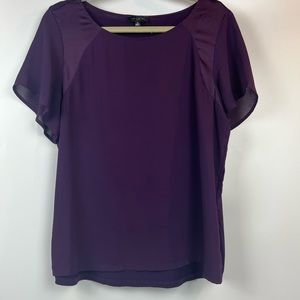 The limited purple short sleeve top. Worn once. Size XL.